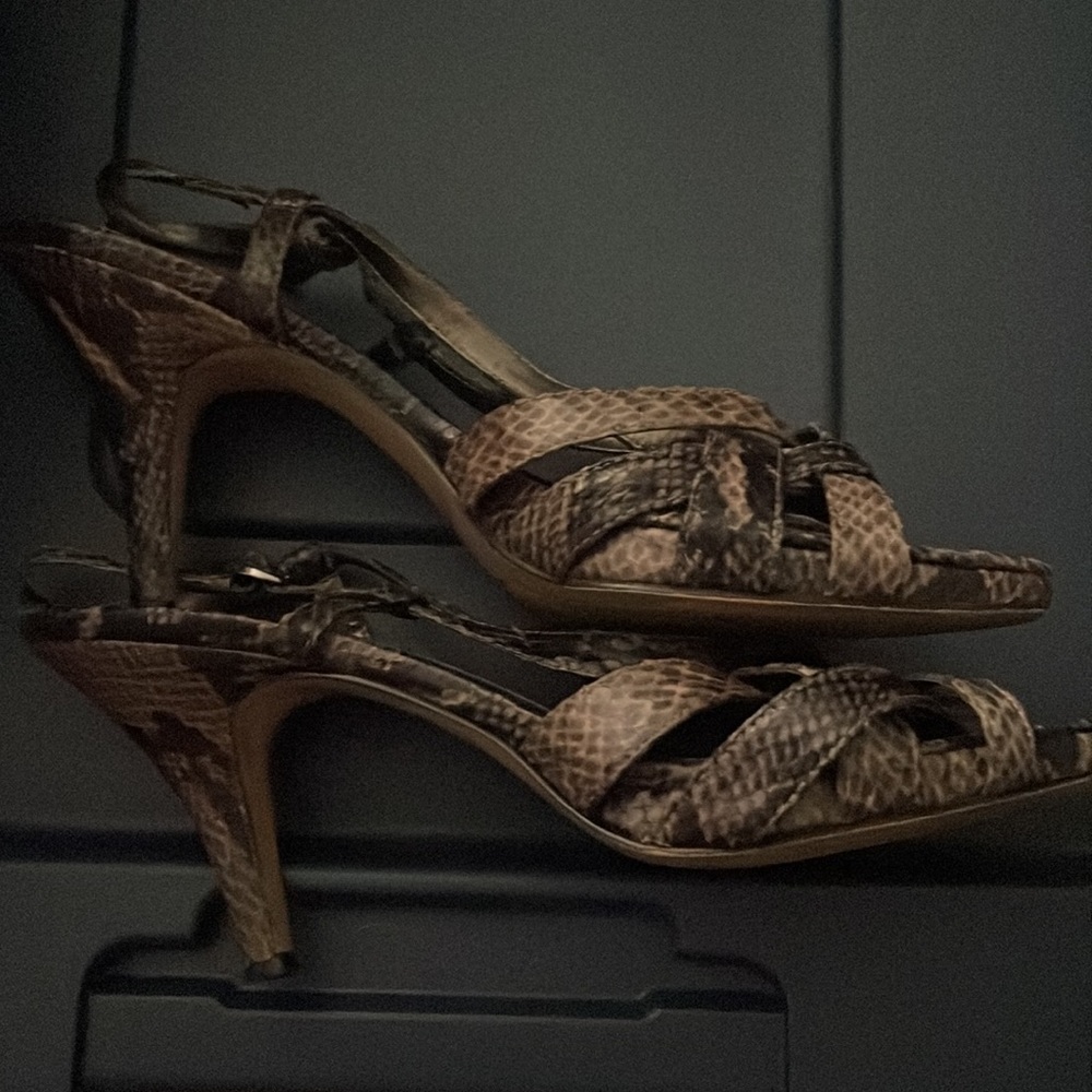Bandolino size 8 M strappy heels. In used condition but still have life. Pics.